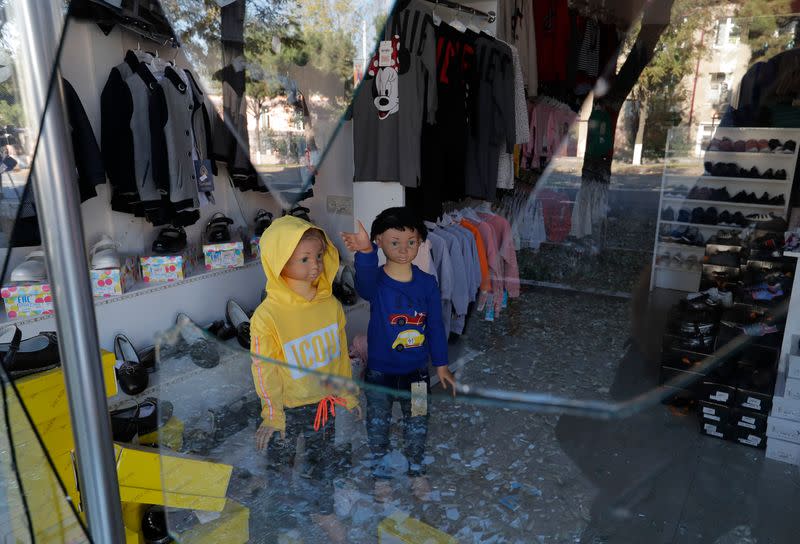 A view shows a damaged store following recent shelling during a military conflict over the breakaway region of Nagorno-Karabakh, in Stepanakert