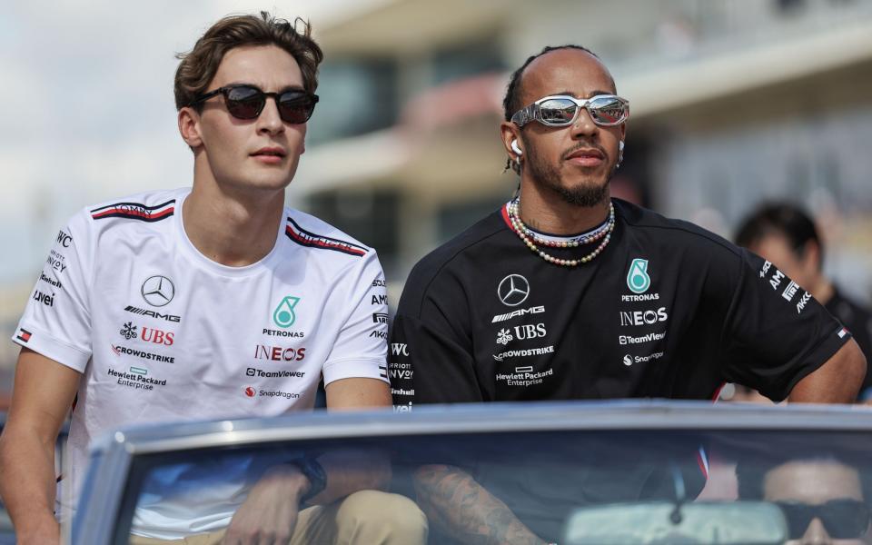 George Russell of Great Britain and Mercedes-AMG PETRONAS F1 Team and Lewis Hamilton of Great Britain and Mercedes-AMG PETRONAS F1 Team during the F1 Grand Prix of United States at Circuit of The Americas on October 22, 2023 in Austin, United States