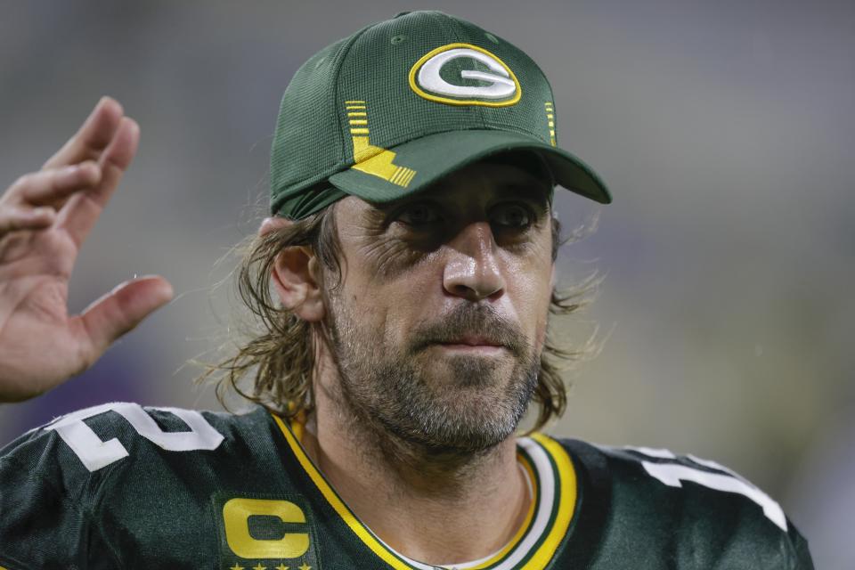 Green Bay Packers' Aaron Rodgers waves to fans as he leaves the field after an NFL football game against the Detroit Lions Monday, Sept. 20, 2021, in Green Bay, Wis. The Packers won 35-17. (AP Photo/Matt Ludtke)