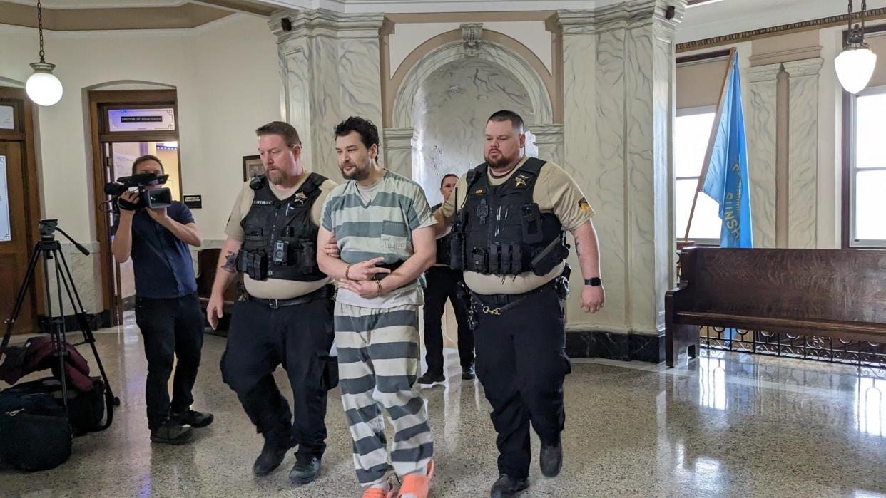 Joseph Hoek is escorted into the courtroom by Moody County Sheriff Troy Wellman for court hearing 11 a.m. Wednesday March 13, 2024, at the Moody County Courthouse in Flandreau, South Dakota.