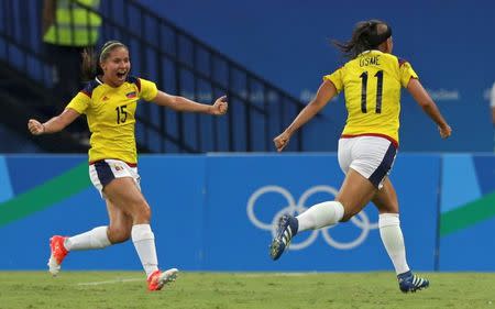 2016 Rio Olympics - Soccer - Preliminary - Women's First Round - Group G Colombia v USA - Amazonia Stadium - Manaus, Brazil - 09/08/2016. Catalina Usme (COL) of Colombia celebrates a goal with Tatiana Ariza (COL) of Colombia. REUTERS/Bruno Kelly