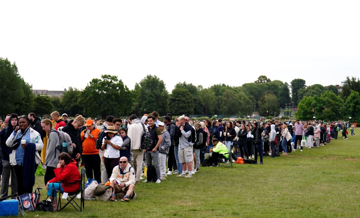 Tennis fans in the queue on day two of the 2023 Wimbledon Championships at the All England Lawn Tennis and Croquet Club in Wimbledon. Picture date: Tuesday July 4, 2023.