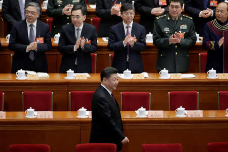 FILE PHOTO: Chinese President Xi Jinping arrives for the opening session of the Chinese People's Political Consultative Conference (CPPCC) at the Great Hall of the People in Beijing, China March 3, 2019. REUTERS/Jason Lee/File Photo