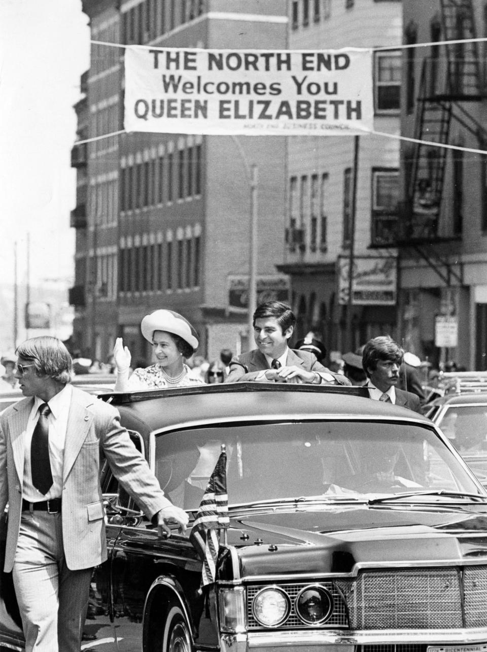 Queen Elizabeth II rides with Governor Michael Dukakis during her visit to Boston in July 1976 - Boston Globe