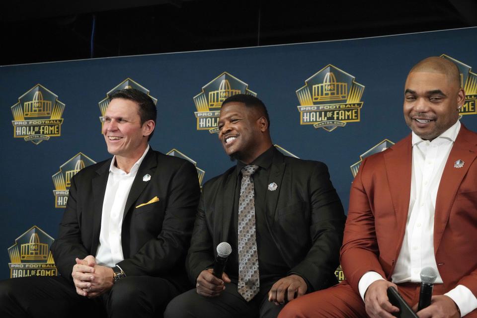 Former Jaguars lineman Tony Boselli (left) and Lee High School graduate LeRoy Butler (center), pictured with former New England Patriots defensive end Richard Seymour, were elected in February to the Pro Football Hall of Fame.