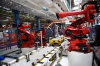 Ceremony to mark the installation of the first robot on the production line for the new electric Fiat 500 BEV at the Mirafiori industrial complex on the 80th birthday of the plant