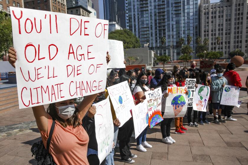 Los Angeles, CA - September 24: Pamela Rangeo, 15, and other students from Alliance Leichtman Levine Family Foundation Environmental Science High School as part of the global strikes to demand climate action, rally at Pershing Square on Friday, Sept. 24, 2021 in Los Angeles, CA. (Irfan Khan / Los Angeles Times)