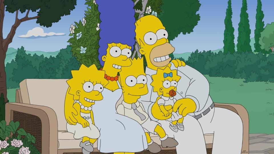 The Simpson family being interviewed in the episode 