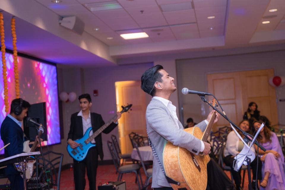 Neekesh Kadariya plays guitar during a Nepali Student Association event at OSU to celebrate the holiday of Dashain, in October 2022. The group is celebrating its New Years on Friday.