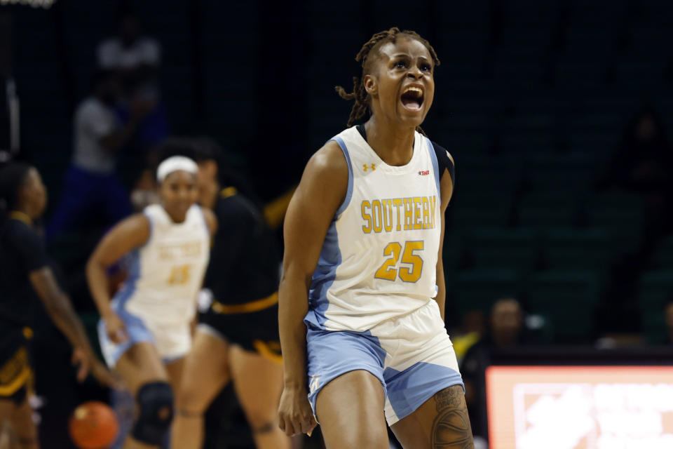 Southern guard Genovea Johnson reacts after making a basket during the second half of an NCAA college basketball game against Arkansas-Pine Bluff in the championship of the Southwestern Athletic Conference Tournament, Saturday, March 11, 2023, in Birmingham, Ala. (AP Photo/Butch Dill)