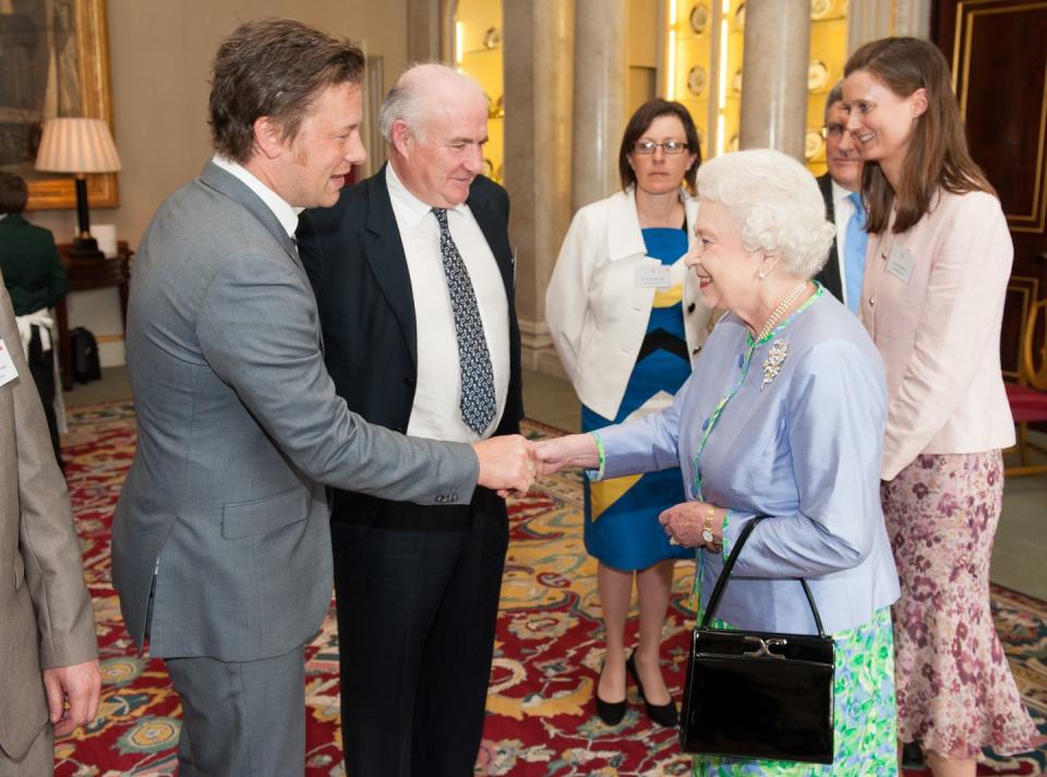 <span class="caption">Rick Stein with Queen Elizabeth II and Jamie Oliver in 2012</span><span class="photo-credit">WPA Pool - Getty Images</span>