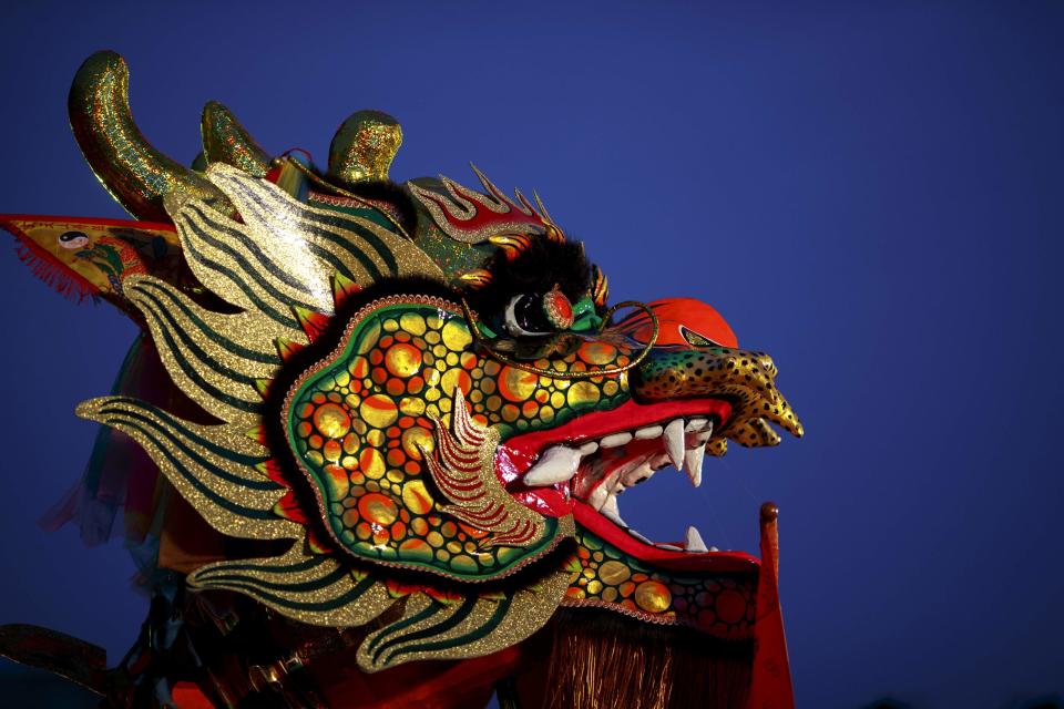 The head of the dragon dance costume is seen as dragon dancers perform as part of the festive Chinese New Year celebrations in Bangkok's shopping district