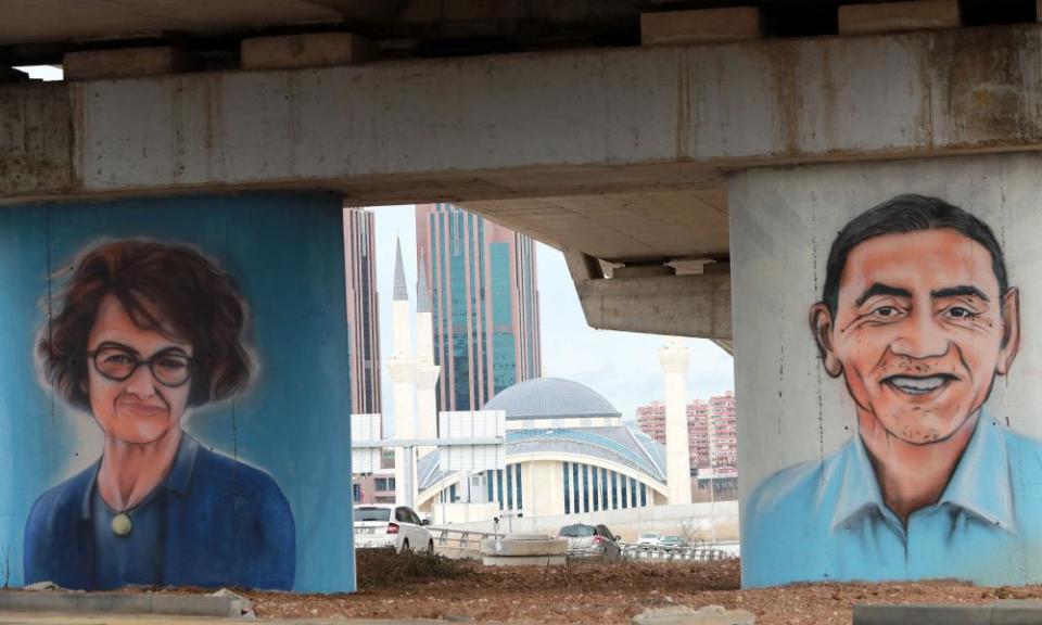 Graffiti in Ankara showing Ozlem Tureci (L) and Ugur Sahin (R).