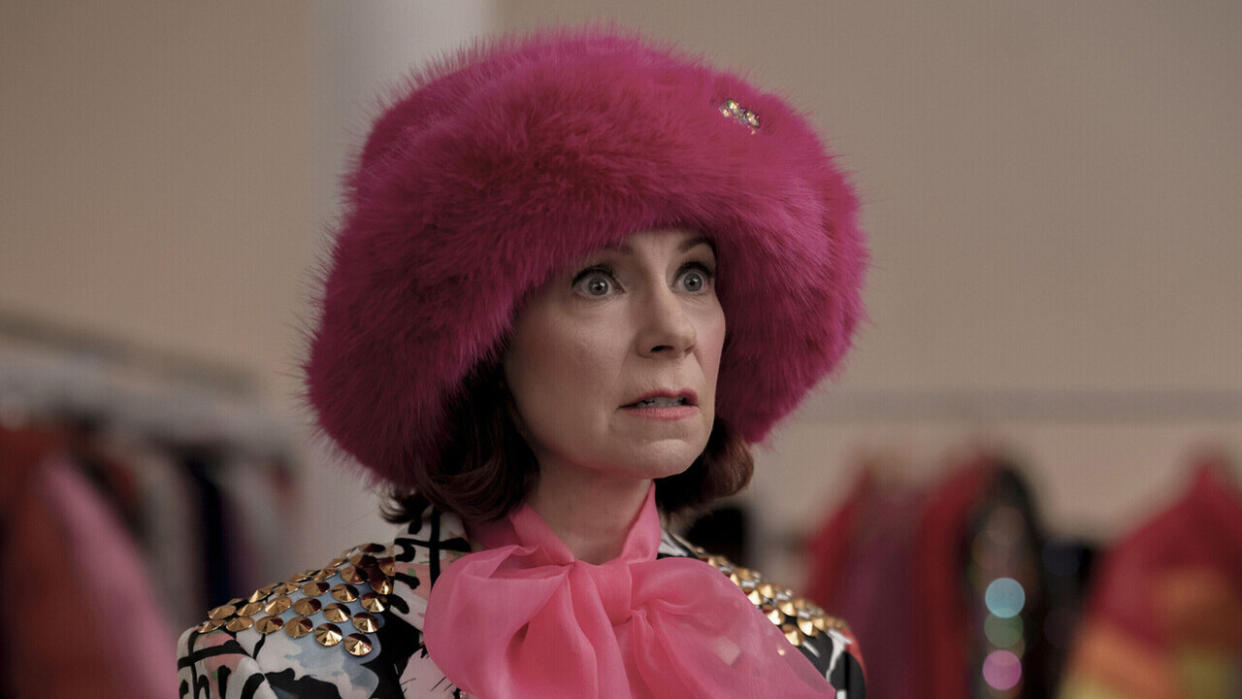  Carrie Preston wearing a pink fuzzy hat as Elsbeth in Season 1 finale. 