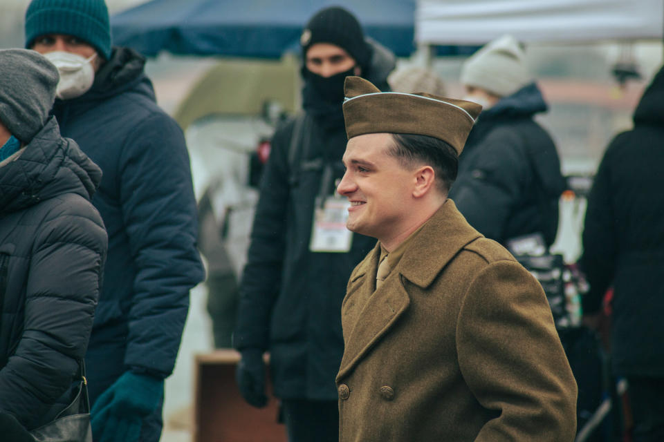 Josh in a military uniform on set