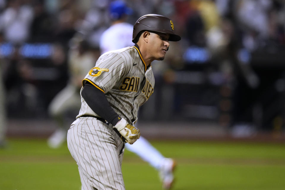 San Diego Padres' Manny Machado runs to second base on a two-run double during the fifth inning of the team's baseball game against the New York Mets on Tuesday, April 11, 2023, in New York. (AP Photo/Frank Franklin II)