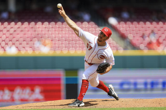 Cincinnati Reds' Kevin Herget throws during the ninth inning of a baseball game against the New York Mets in Cincinnati, Thursday, May 11, 2023. The Reds won 5-0. (AP Photo/Aaron Doster)