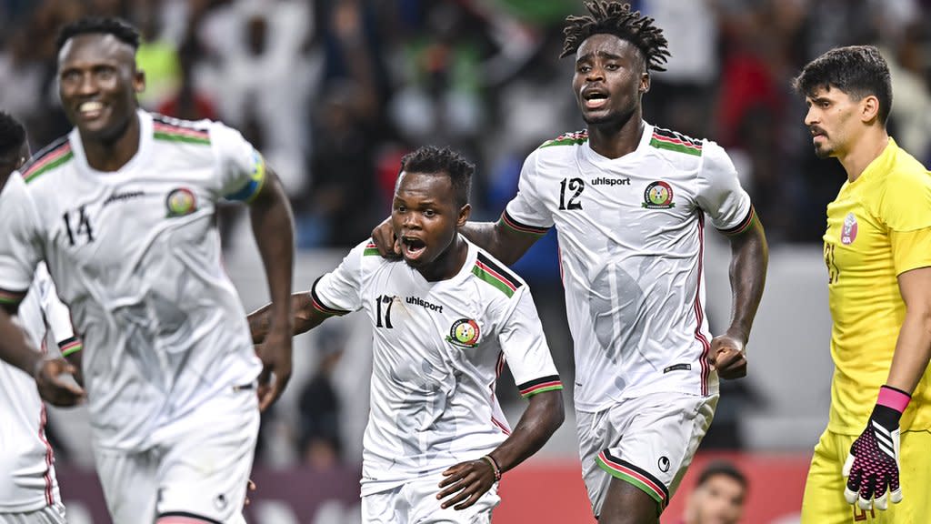 Kenya celebrate scoring a goal against Qatar in a friendly match