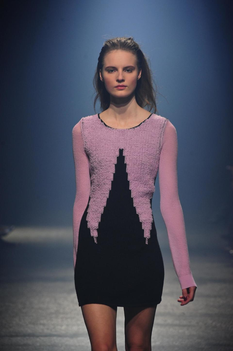 A model wears a creation by Sonia Rykiel during the presentation of her Fall/Winter 2013-2014 ready to wear collection in Paris, Friday, March 1, 2013. (AP Photo/Zacharie Scheurer)
