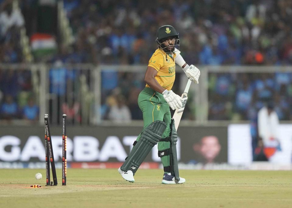 South Africa's Temba Bavuma is bowled out by India's Deepak Chahar during the first Twenty20 cricket match between India and South Africa in Thiruvananthapuram, India, Wednesday, Sept. 28, 2022. (AP Photo/Mahesh Kumar A.)