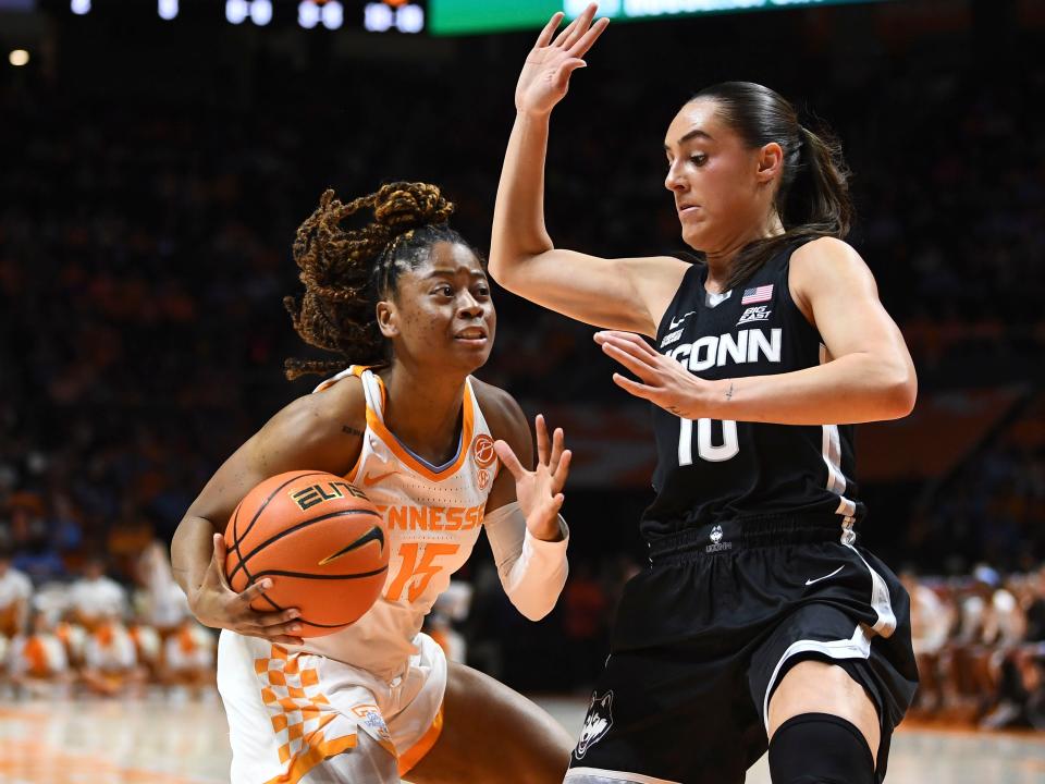 Tennessee's Jasmine Powell (15) tries to get to the basket while guarded by UConn's Nika Mühl (10) during the NCAA college basketball game between the Tennessee Lady Vols and Connecticut Huskies in Knoxville, Tenn. on Thursday, January 26, 2023. 