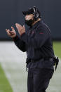 Atlanta Falcons head coach Dan Quinn encourages his team during the second half of an NFL football game against the Green Bay Packers, Monday, Oct. 5, 2020, in Green Bay, Wis. (AP Photo/Tom Lynn)