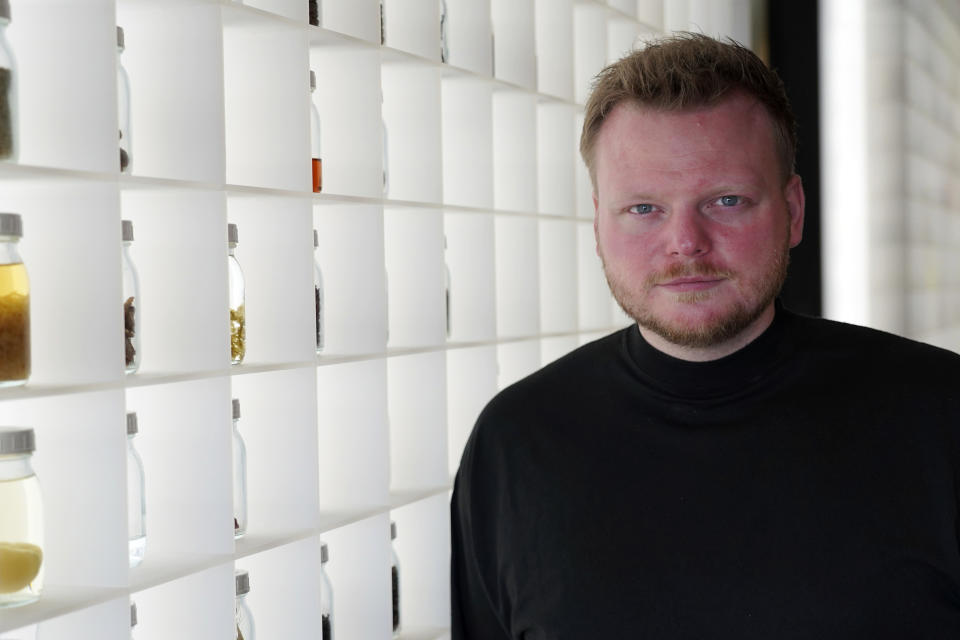 Rasmus Munk, co-owner and chef of Alchemist restaurant, poses inside Alchemist’s kitchen, in Copenhagen, Denmark, Monday May 6, 2024. The Danish Michelin-starred chef has teamed up with the Florida-based startup Space Perspective to take fine-dining to our upper atmosphere in late 2025. Six guests are set to ascend to the stratosphere, where they will enjoy an immersive dining experience served up by chef Rasmus Munk. (AP Photo/James Brooks)