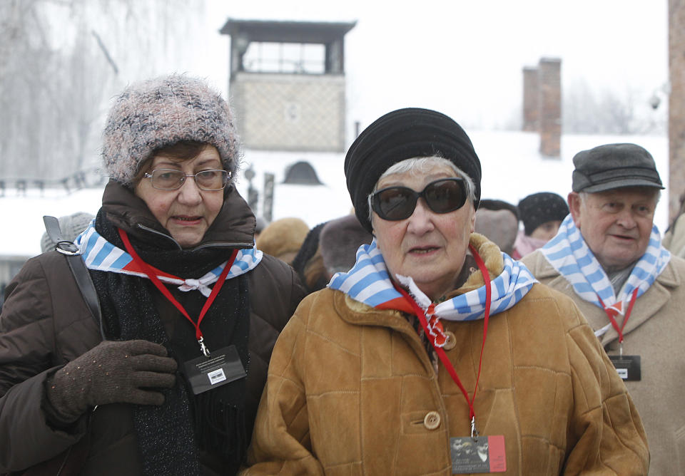 Holocaust survivors arrive for a ceremony to mark the 69th anniversary of the liberation of Auschwitz Nazi death camp's in Oswiecim, Poland, on Monday, Jan. 27, 2014, since the Soviet Red Army liberated the camp. Israeli lawmakers and government officials are to attend anniversary observances later in the day. The Nazis killed some 1.5 million people, mostly Jews at the camp during World War II. (AP Photo/Czarek Sokolowski)