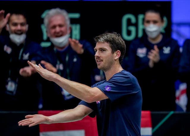 The British backroom staff celebrate Cameron Norrie's win over Czech Jiri Lehecka