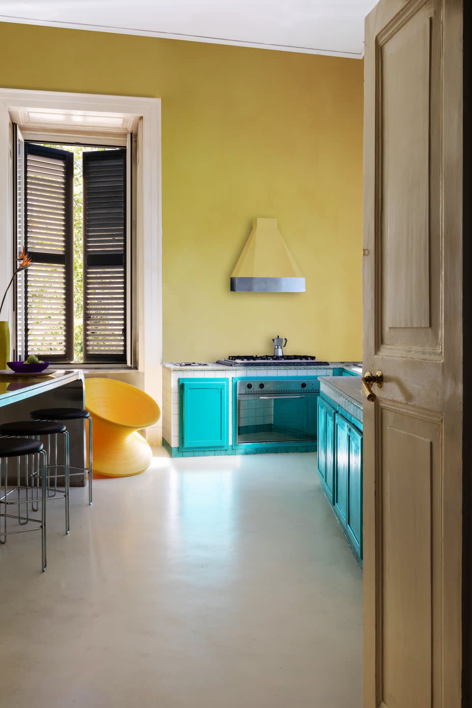 apartment of anna masello and giovanni izzo in naples photography by monica spezia living inside kitchen