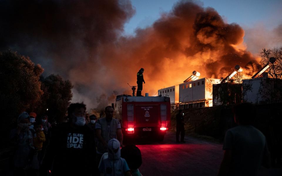 Huge fires, fanned by strong winds, have razed the camp to the ground - Reuters