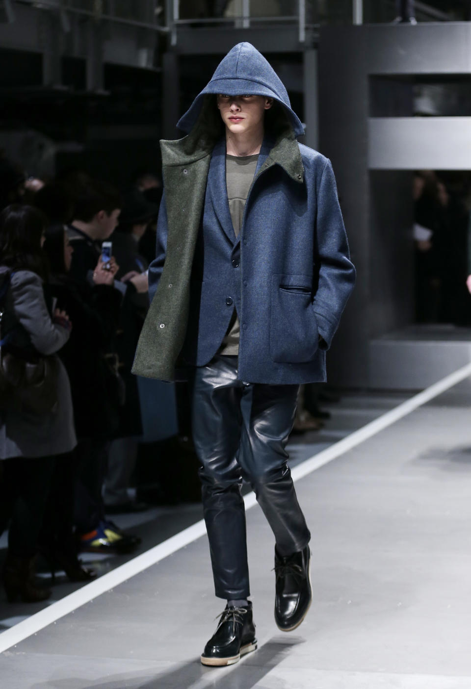 A model wears a creation for Fendi men's Fall-Winter 2013-14 collection, part of the Milan Fashion Week, unveiled in Milan, Italy, Monday, Jan. 14, 2013. (AP Photo/Antonio Calanni)