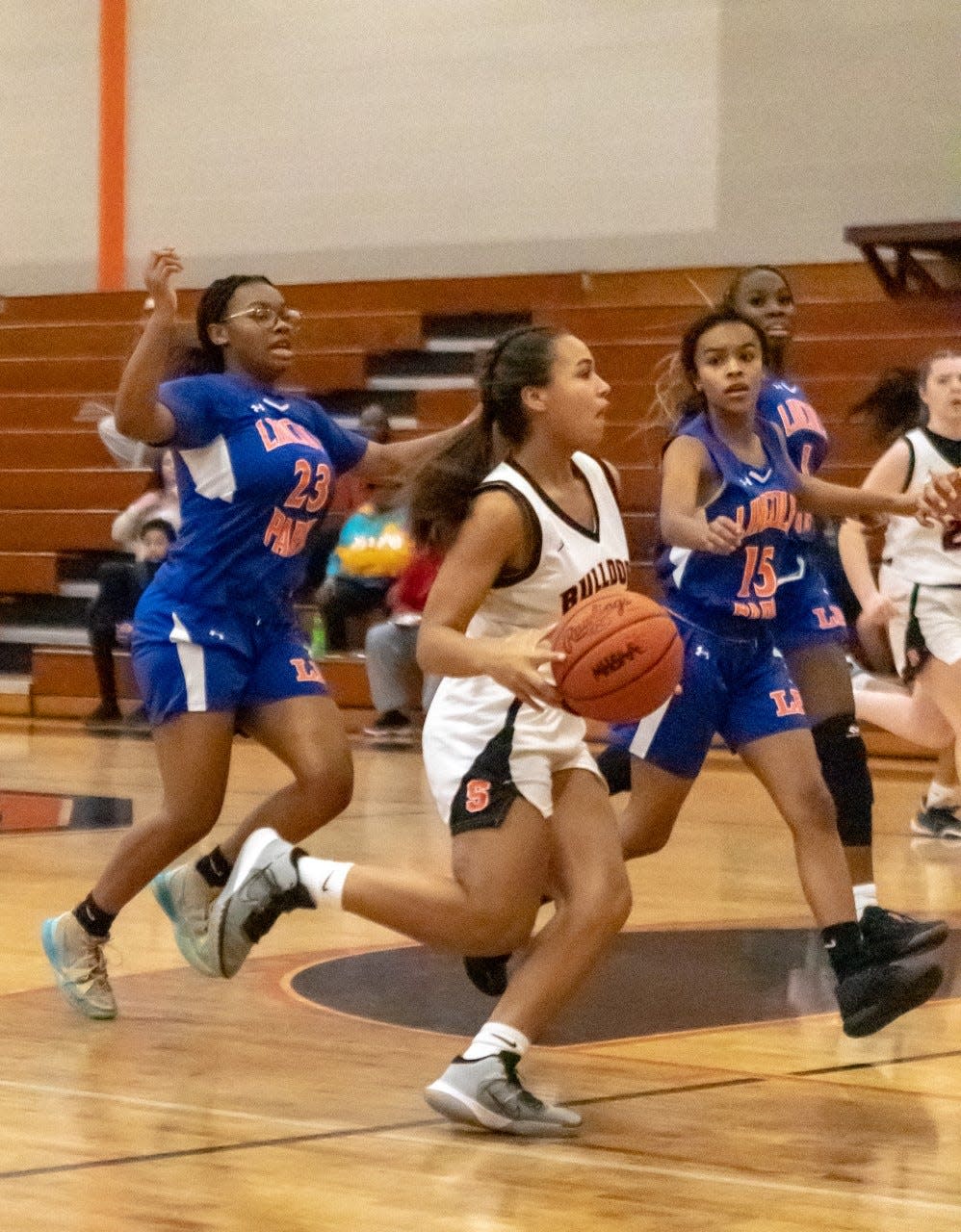 Summerfield's Destanee Smith drives to the hoop in the season opener against Lincoln Park Thursday, December 1, 2022.