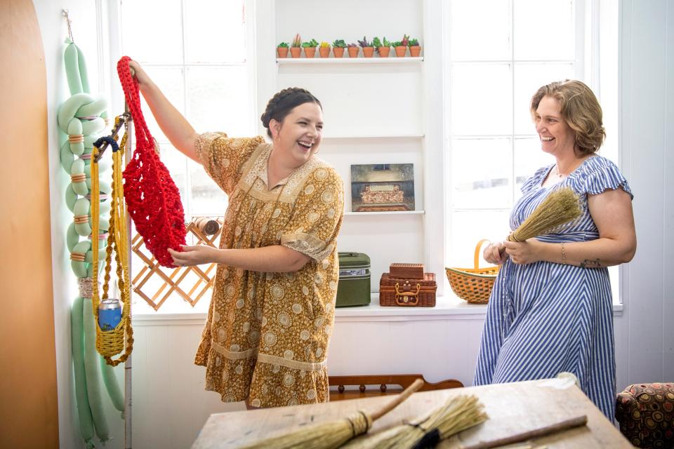 Taylor Bento, left, and Victoria Walsh, right, share a laugh in their studio on Tuesday, June 7, 2022. Bento and Walsh run KnoxCrafts, which puts crafters together with fans for onsite workshops in a variety of local venues.