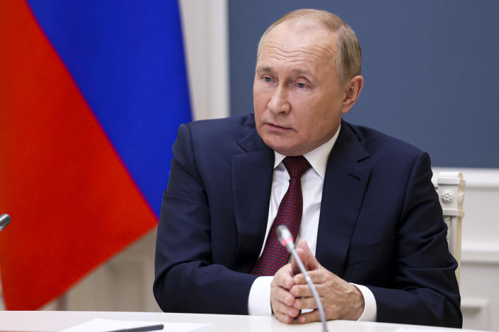 Russian President Vladimir Putin attends a video call of the VTB Capital "Russia Calling!" Investment Forum in Moscow, Russia, Tuesday, Nov. 30, 2021. (Mikhail Metzel, Sputnik, Kremlin Pool Photo via AP)