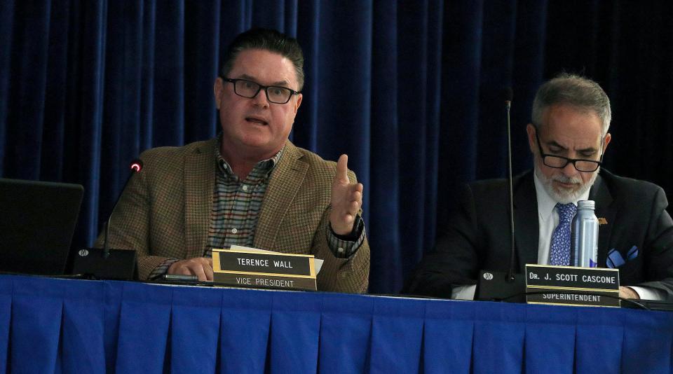 Holmdel Board of Education Vice President Terence Wall speaks during their meeting Wednesday night, September 27, 2023. They were considering whether to repeal its current student transgender policy, a move that would remove explicit protections for transgender students from the district's policy manual. At right is district Superintendent Dr. J. Scott Cascone.