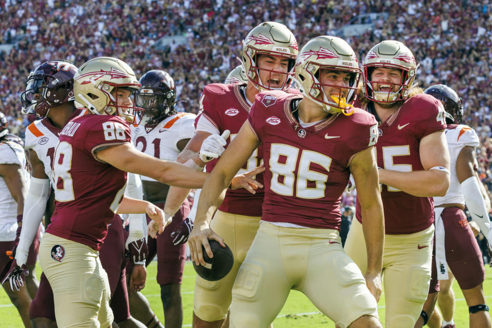 Florida State tight end Brian Courtney (86) celebrates his two point conversion against Virginia Tech during the first half of an NCAA college football game, Saturday, Oct. 7, 2023, in Tallahassee, Fla. (AP Photo/Colin Hackley)