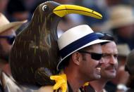 A New Zealand supporter, with an inflatable Kiwi on his shoulders, watches during the third day of the third cricket test match against Australia at the Adelaide Oval, in South Australia, November 29, 2015. REUTERS/David Gray