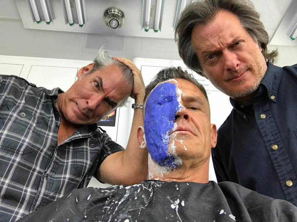 <p>Brolin preps for work on June 28, writing: “insanity on the brink. Face is morphing into something machine, fierce, hair sliced, arm machined, bulged. Where is Deadpool?!? Looking. Looking. All I got are these two…molding me, prodding, turning me into something hard.” (Photo: <a rel="nofollow noopener" href="https://www.instagram.com/p/BV5Bcbiho9Z/" target="_blank" data-ylk="slk:joshbrolin/Instagram;elm:context_link;itc:0;sec:content-canvas" class="link ">joshbrolin/Instagram</a>) </p>