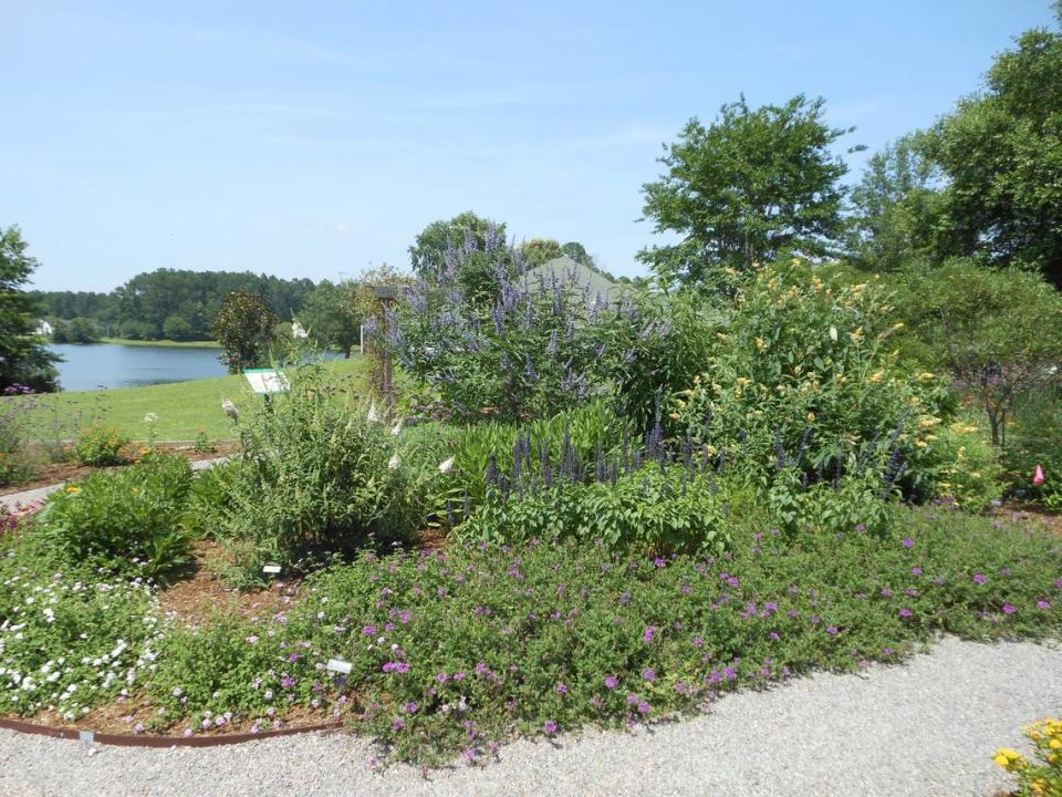 The Sun City Hilton Head Community Hummingbird & Butterfly Garden is laid out in a figure eight shape and overlooks Lake Somerset  