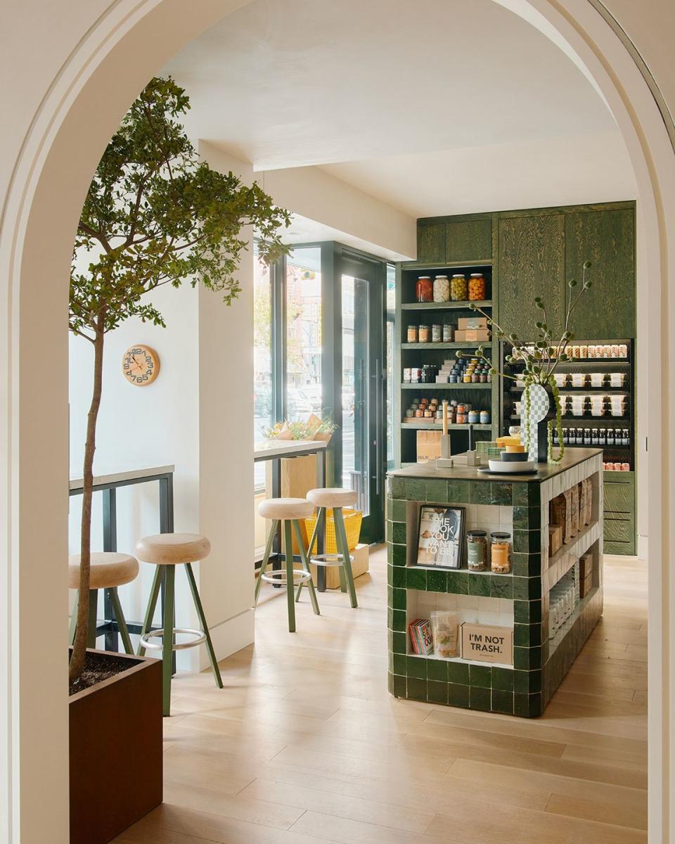 <p>Wellness, sustainability, and design come together at a new marketplace and café on the Upper East Side. Founded on the principles of health and conscious living, <a href="https://www.isleof.us/" rel="nofollow noopener" target="_blank" data-ylk="slk:Isle of Us;elm:context_link;itc:0;sec:content-canvas" class="link ">Isle of Us </a>offers wholesome and nourishing made-to-order and prepared foods, along with a rotating selection of house made pantry provisions, as well as home goods curated from brands with shared values. The all-day menu by chef Matt Aita (previously at Little Beet Table and Jean-Georges) includes breakfast bowls, an array of sandwiches, and a host of inventive salad and vegetable side dishes. The playful dining room by <a href="https://www.nicholasobeid.com/" rel="nofollow noopener" target="_blank" data-ylk="slk:Nicholas Obied;elm:context_link;itc:0;sec:content-canvas" class="link ">Nicholas Obied </a>features marigold leather banquettes, bronze countertops, colorful tilework, and other custom details. Worth noting are the restaurant’s efforts to reduce its environmental impact including, sourcing hyper-local ingredients whenever possible, adhering to an active recycling and commercial composting program, maximizing all ingredients in food production to minimize waste, and reducing the use of plastic in front and back of house operations.</p>