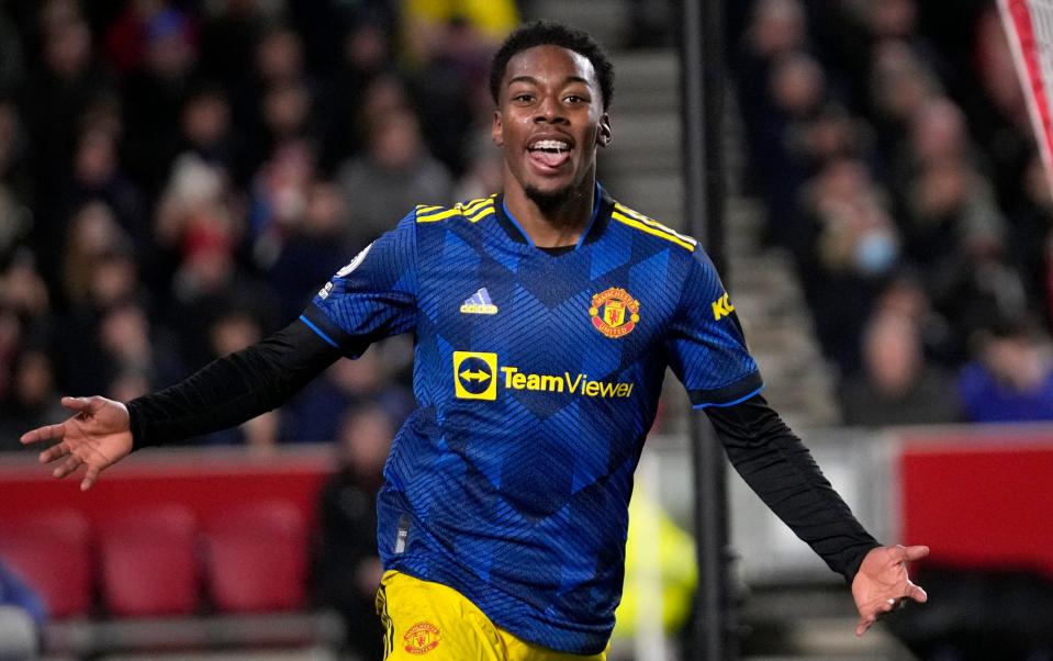 Manchester United's Anthony Elanga celebrates after scoring the opening goal during an English Premier League soccer match - AP