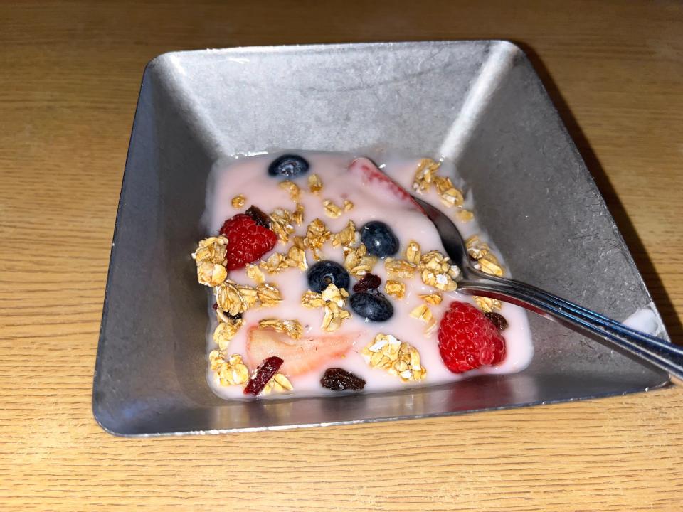 strawberry yogurt parfait in square bowl at trail's end
