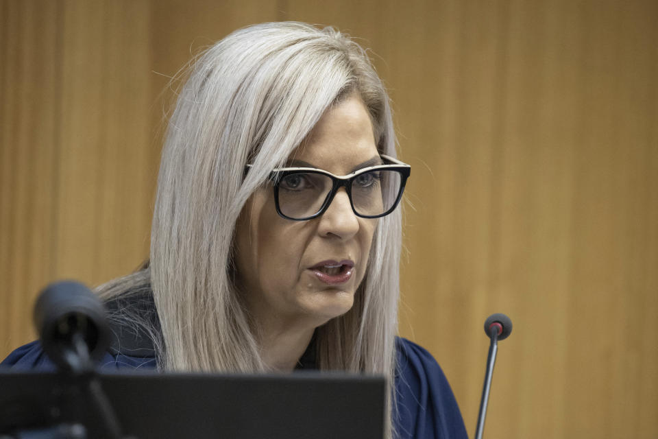 Coroner Brigitte Windley speaks during a coroner's inquiry in Christchurch, New Zealand, Tuesday, Oct. 24, 2023, into the 2019 mosque shootings. The inquiry into New Zealand’s worst mass-shooting will examine, among other issues, the response times of police and medics and whether any of the 51 people who were killed could have been saved. (Iain McGregor/Pool Photo via AP)