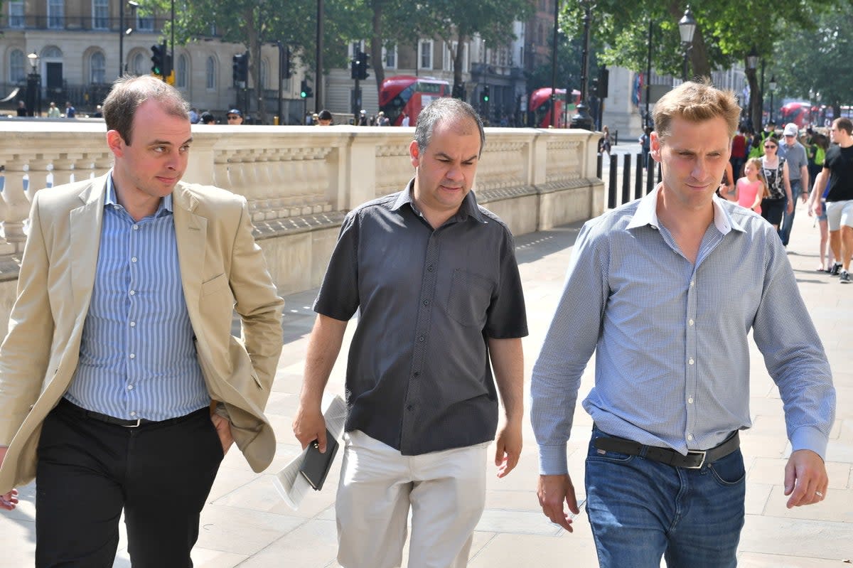 Left to right: MPs Matt Warman, Paul Scully and Chris Philp arrive ahead of a briefing for Conservative MPs on the cabinet's Brexit plans in Whitehall, central London (PA)