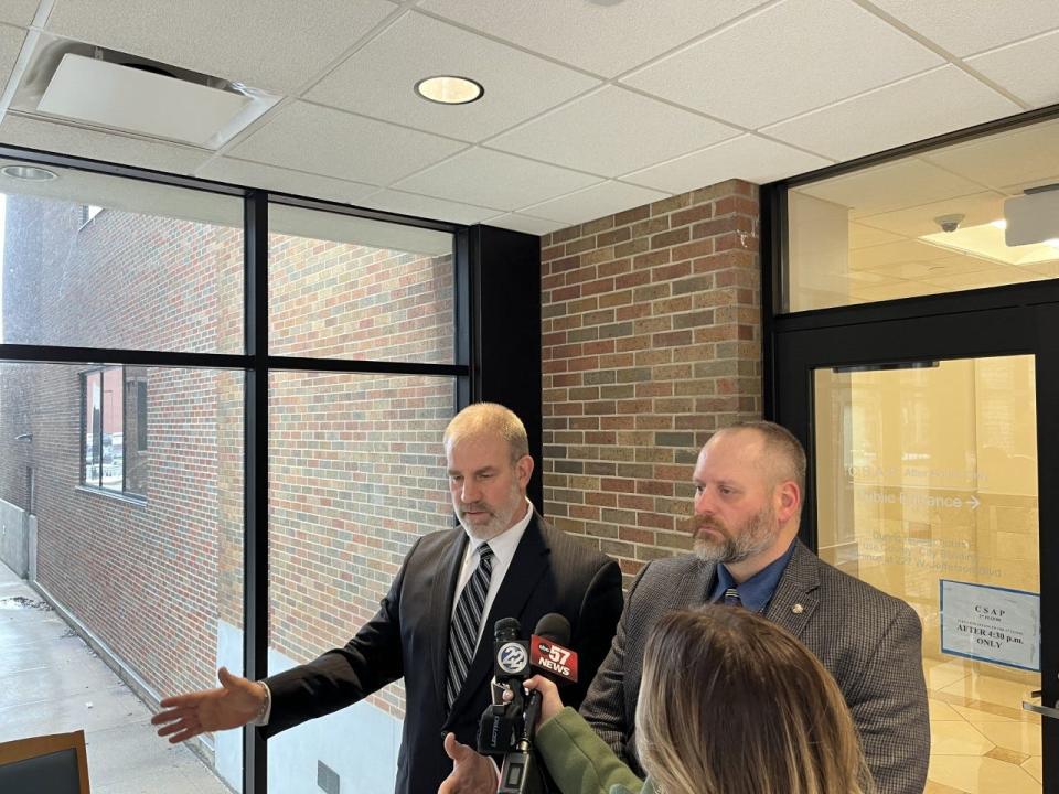 Chief Deputy Prosecutor Chris Fronk, left, and Mishawaka police detective Timothy Wiley speak to reporters after the verdict was handed down in a murder trial for Anthony Hutchens at the St. Joseph County Courthouse on Thursday, Jan. 26, 2023.