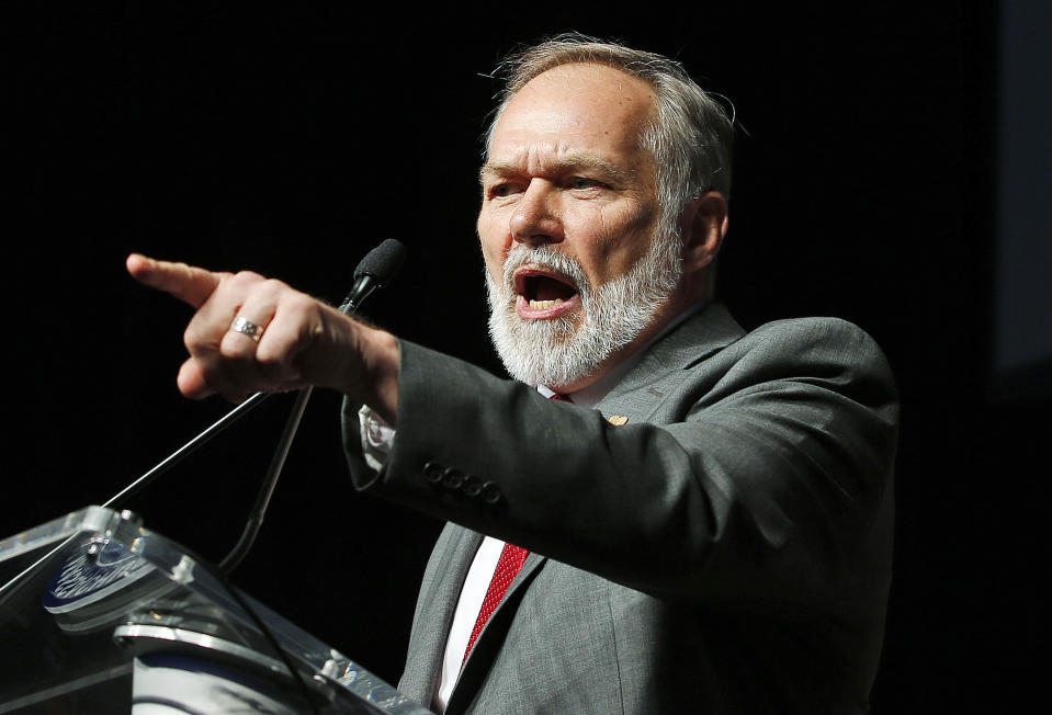 FILE - In this Saturday, April 28, 2018 file photo, Republican candidate for governor Scott Lively addresses the Massachusetts Republican Convention at the DCU Center in Worcester, Mass. Lively will challenge incumbent Gov. Charlie Baker in the Sept. 4 Republican primary. (AP Photo/Winslow Townson, File)