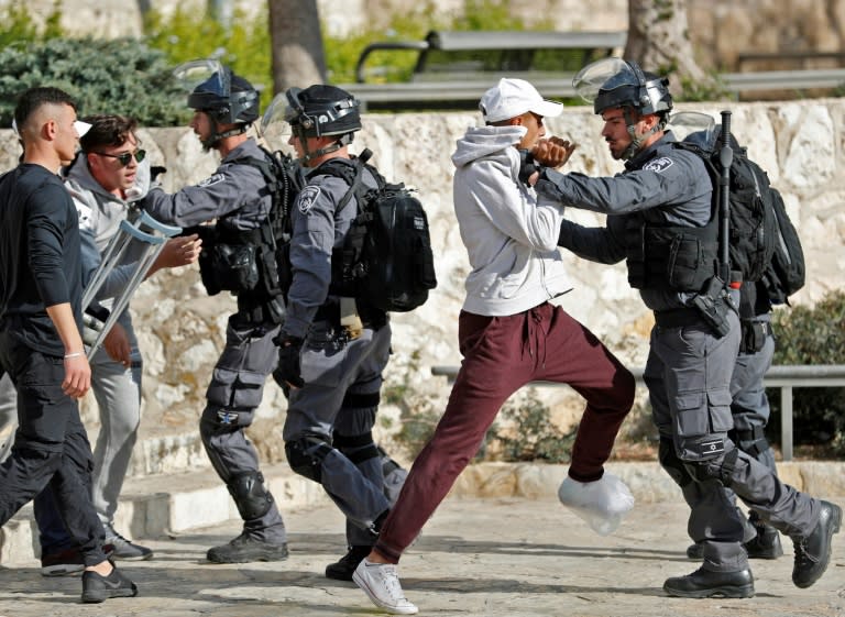 Israeli security forces scuffle with Palestinian protesters in Jerusalem's Old City on December 15, 2017