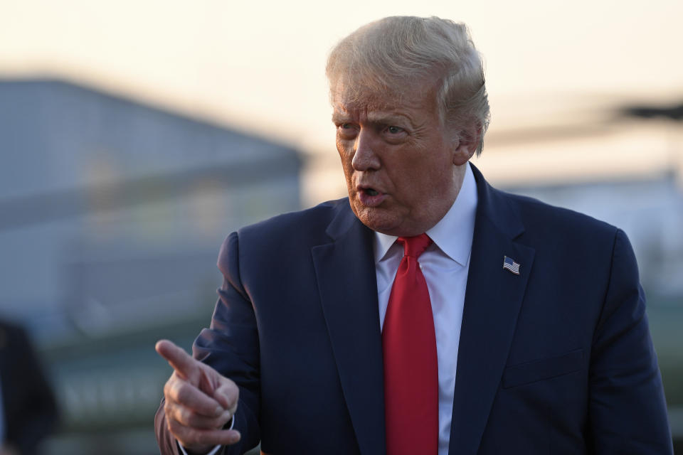 President Donald Trump talks with reporters before departing from Morristown Municipal Airport on Aug. 9, 2020. Trump was returning to Washington after spending the weekend at Trump National Golf Club. (AP)