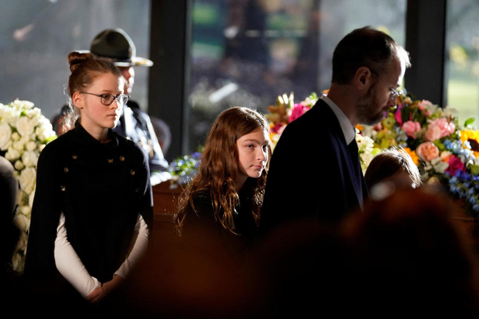 Members of the Carter family depart after a repose service for former U.S. first lady Rosalynn Carter at the Jimmy Carter Presidential Library and Museum in Atlanta, Georgia, U.S., Monday, Nov. 27, 2023. The former first lady died on Nov. 19. She was 96.  / Credit: Brynn Anderson/Pool via REUTERS